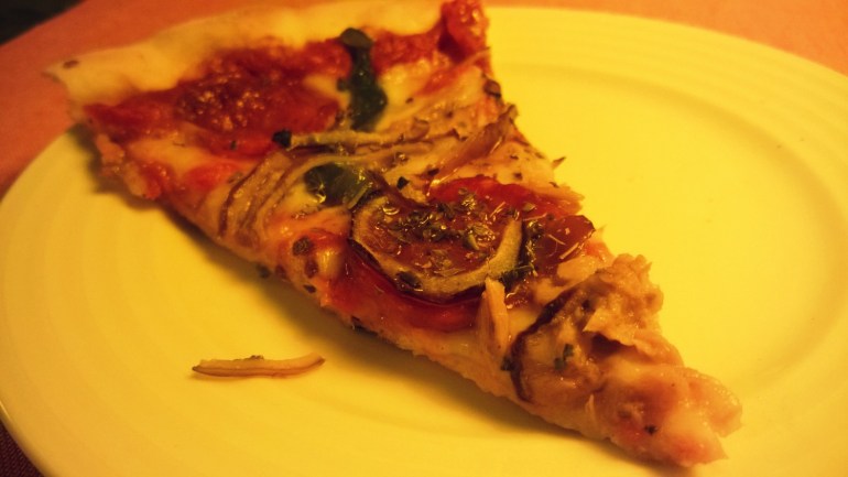 Tutejsza pizza - mała i dość droga, ale świetnie smakuje